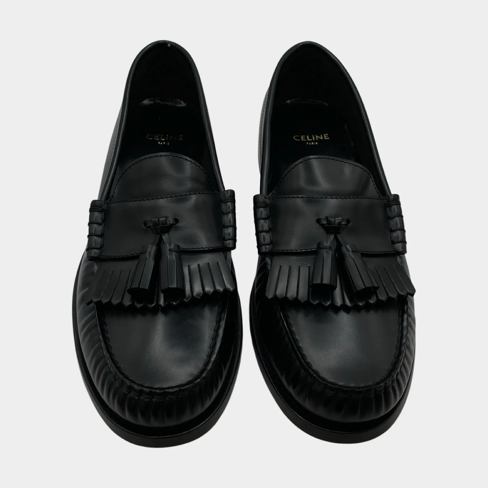 Celine black leather tassle loafers